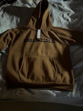ESSENTIALS Men's Hoodie in Brown with Black Logo